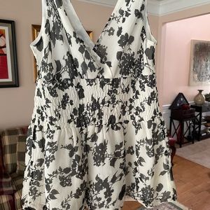 Silk tan with black flowers. Two layers with tan under sheath